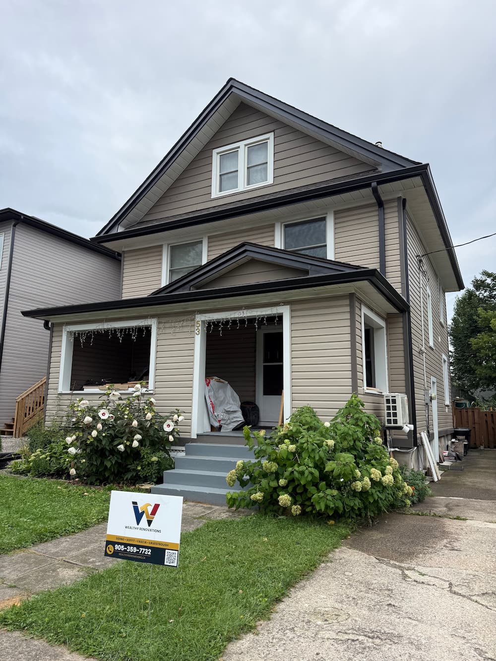 Two-story home exterior siding project